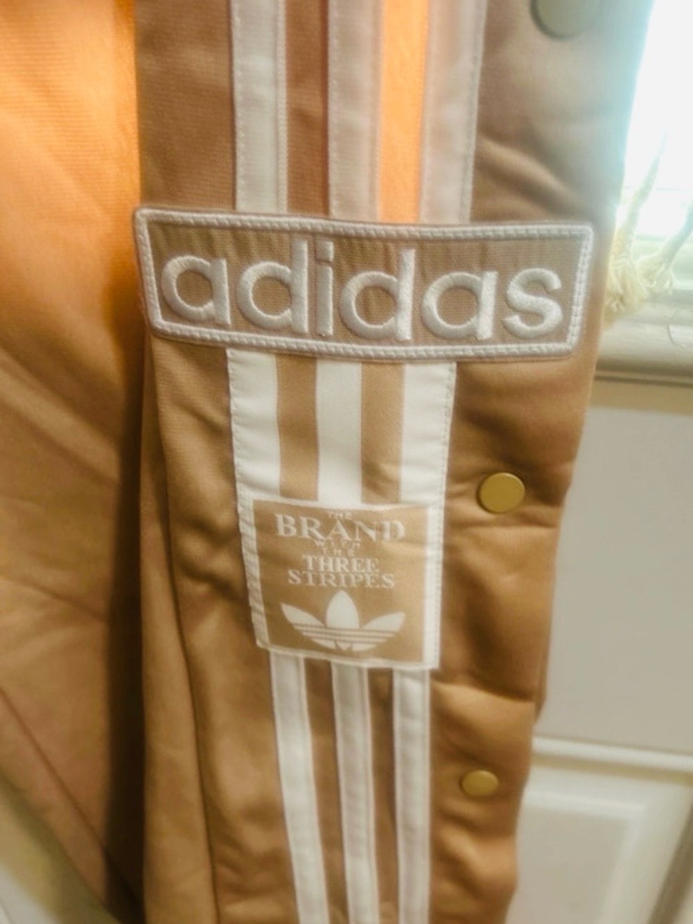 adidas breakaway jogger in Light Tan and Cream